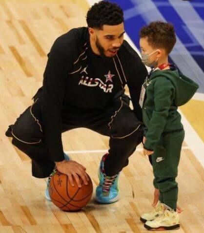 Justin Tatum son Jayson Tatum and grandson Jayson Jr. at the basketball court.